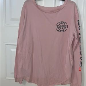 a light pink shirt